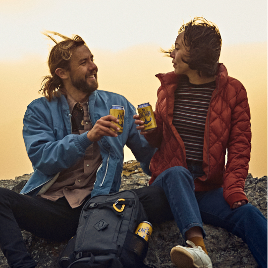 Sharing a beer on the beach